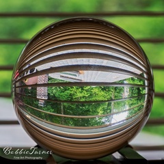 BobbieT-lens-ball-reflection-through-blinds